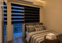 Modern Black 1BR Pool View w/ Netflix | Shore Pasay Near Mall of Asia - Infinity Pools