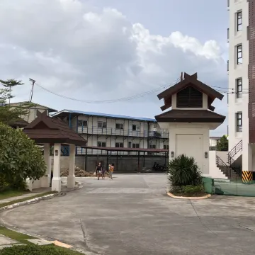 Seven-Eleven Inn 1BR Condo - Royal Oceancrest Mactan