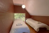 A private cottage in the forest, limited to one group per day — undo