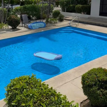 Poolside 2BR Retreat | Walk to Coco Beach