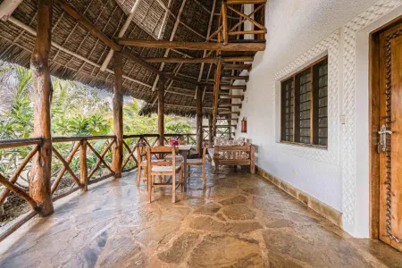 Exploreans Malaika Villas & Beach Club Отели в г. Малинди