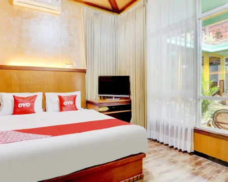 OYO 90303 Cafe & Homestay Kolam Pancing Abah Hotels in Singosari