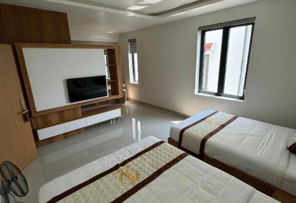 퉁람 호텔 외관 야경 이미지