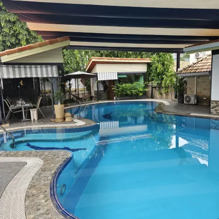 Separate luxurious 2 BR house with swimming pool.