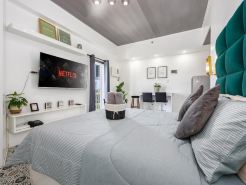 Jolenia by J&J | Studio near airport w/ pool & gym