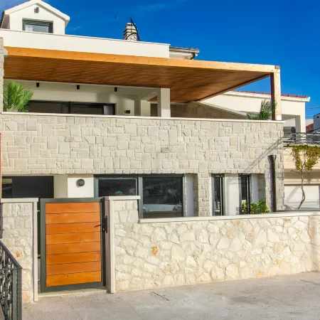 Seafront villa Kupinica with private indoor Pool
