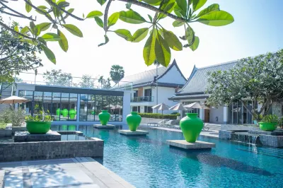 Seven-Colored Oasis Hotels near Kombat Group Thailand