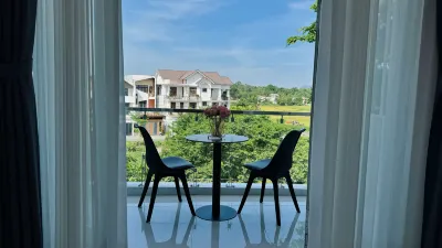 Niki Homestay Hotels near Quoc Hoc High School