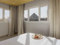 Brassbell l By the Pyramids Near Grand Museum Hotels in Giza