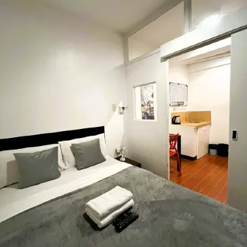 BGC Suites EDSA Отели рядом с достопримечательностью «Корейское посольство»