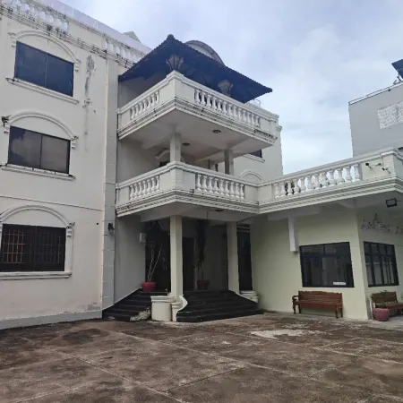 Yujia Homestay Отели рядом с достопримечательностью «Пляж Victory»