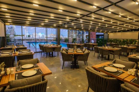 Caddemm Inn Hotel Отели в г. Agios Georgios