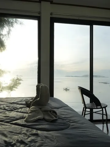 รูปภาพของห้องติดทะเลเเละพระอาทิตย์