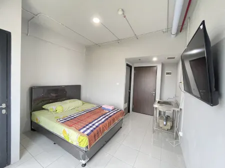 Keny Room @ Apt Riverdale Cikarang Отели рядом с достопримечательностью «Bonecom Tricom Mm2100»
