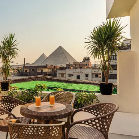 Zahira Pyramids view Отели рядом с достопримечательностью «Панорамный вид пирамид»