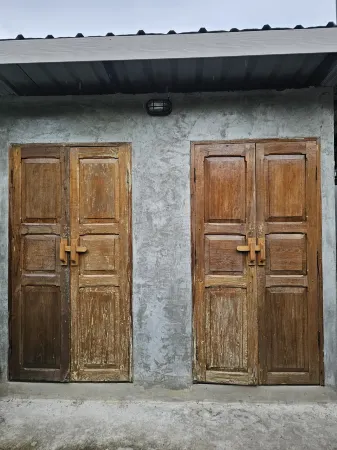 The Bird Nest Homestay& Coffee Shop Отели в г. Phra Pradaeng