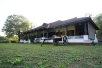 Highland Estate Hotels near Sri Rameshwara Devasthana Agani