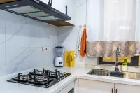 Chic Loft steps from Yaya Center | Pool + gym