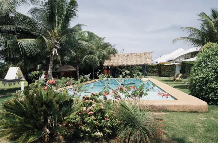 BELLE HOMES Отели рядом с достопримечательностью «Best Sunset Hermit Beach»