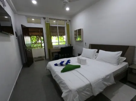Dhangethi Inn Отели в г. Vilamendhoo