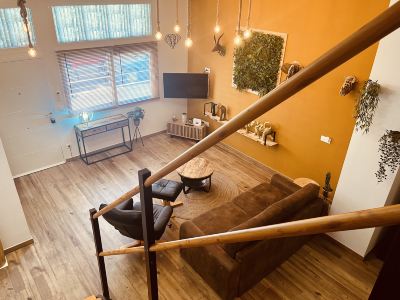 Forest-Themed Duplex Loft Near the Beach