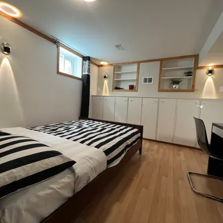 Self-contained Queen Suite • Private Kitchenette & Bath