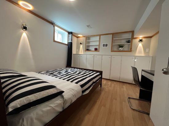 Self-contained Queen Suite • Private Kitchenette & Bath