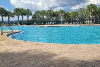 Cozy 4-bedroom house in Davenport- Haines City with WiFi, AC, Game Room, Screened Lanai - WiFi