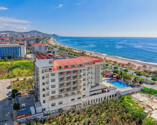 Sey Beach Hotel & Spa Hotels near كهف ديم