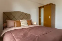 Calma 2BR II @Skyhouse Apartment Hotels near PMC Telaga Mekarwangi