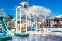 2-Bed Family Haven with Pools, BBQ & Playgrounds