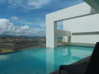 Cityscape Smart Studio w/ 200Mbps WiFi, Pool Access and PS4 near IT Park - Ramah keluarga