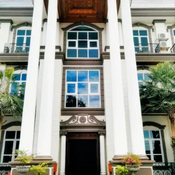 Hong Ye Yuan Tu Hotel Отели рядом с достопримечательностью «Храмовый комплекс Пха Тхат Луанг»