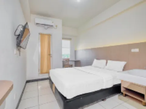 Quintessa Room at Candiland Apartement Hotels in Candisari