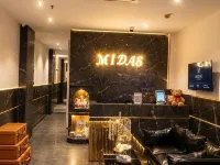 MIDAS HOTEL Hoteles cerca de Distrito 10