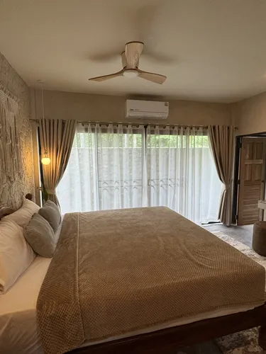 รูปภาพของTropical Garden Stylish Resort-Style Private Pool Villa
