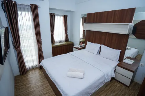 Seven Living Tamansari Mahogany Karawang -  Privatzimmer