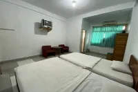 Hotel O near RS Awal Bros Sudirman formerly Flora Hotel - Parkplatz