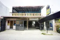 OYO 94768 Al-hamra Guest House Ξενοδοχεία στην πόλη 