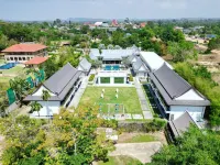 Seven-Colored Oasis Hotels near Kombat Group Thailand