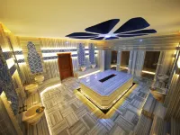 Sey Beach Hotel & Spa Hotels near كهف ديم