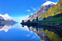 Fjordfront Farmhouse | Sauna, Boat & Sunnmøre Alps - Homestays
