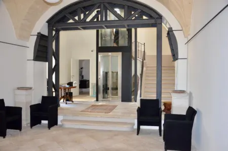 Palazzo della Torre 201– Modern Historic Apartment Отели в г. Parco Scizzo-parchitello