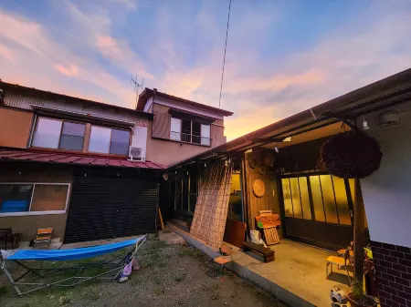 Guesthouse Mikansei Отели в г. Каванехон