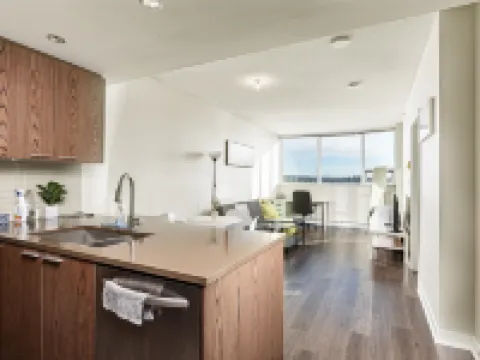 Coquitlam Center Bright & Modern 1BR Parking included Steps to SkyTrain | Pool & Gym Hotels in Coquitlam