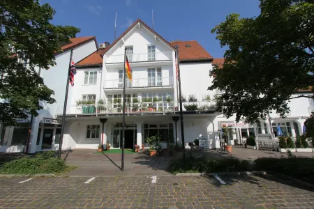 Abasto Hotel Eichenau Отели в г. Ольхинг