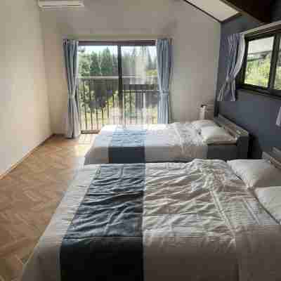 10 min from Kurokawa | Forest lodge | Huge trampoline | Free BBQ | Up to 10 guests | 180 m² Rooms