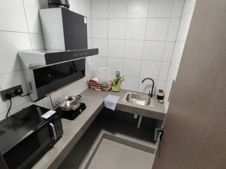 CHIENG APARTMENT Отели рядом с достопримечательностью «Yayasan Sultan Haji Hassanal Bolkiah Complex»