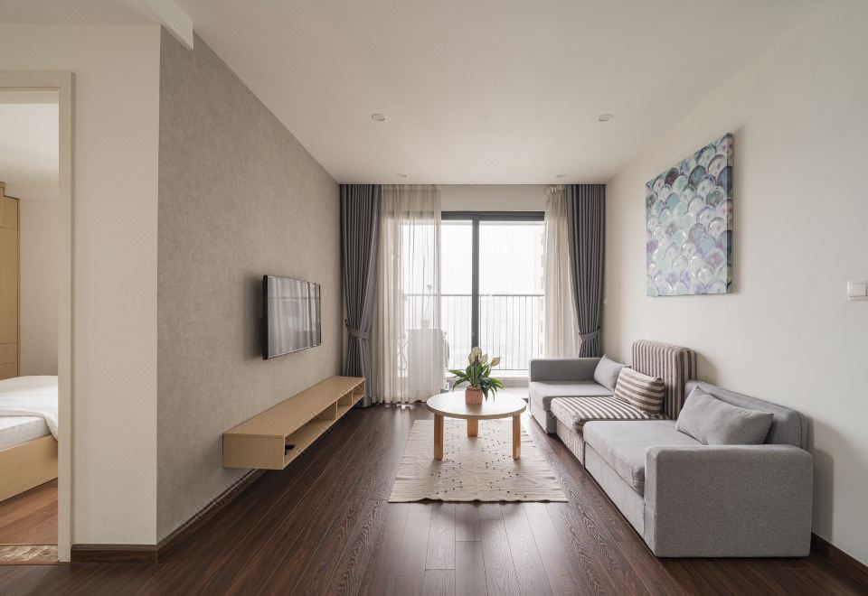 Vinhomes D'Capitale Luxury Apartment의 깔끔한 주방 및 거실 이미지