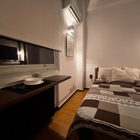 Cozy Apartment in Kypselii: 1000Mbps Fiber Wi-Fi Отели рядом с достопримечательностью «Станция метро Panormou»
